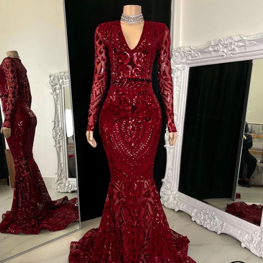 "Lynira Label" Talisha dress in a red burgundy. Size medium and was worn once.